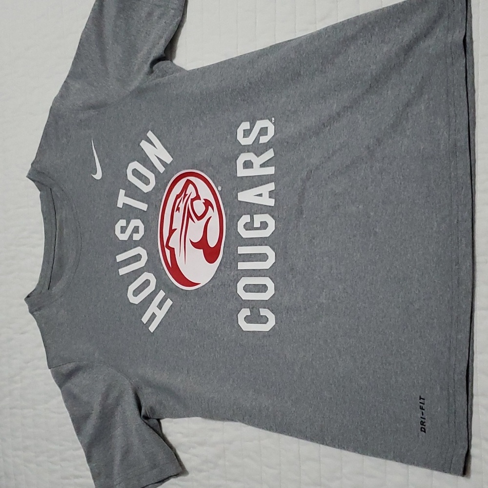 Kids size Large UH dry fit shirt